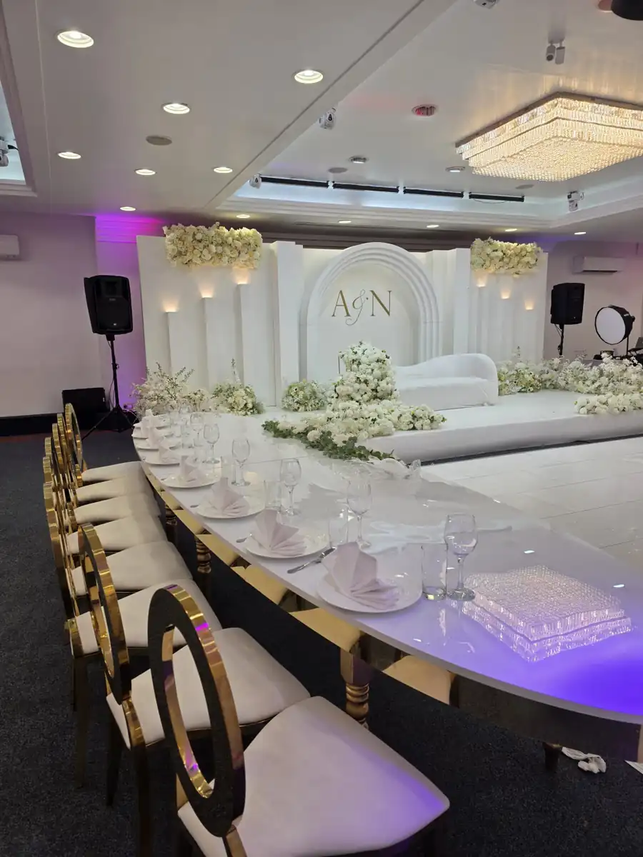 Banquet table alongside the wedding stage